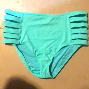 Bathing suit bottoms. Almost full coverage. Mint color. Never worn.